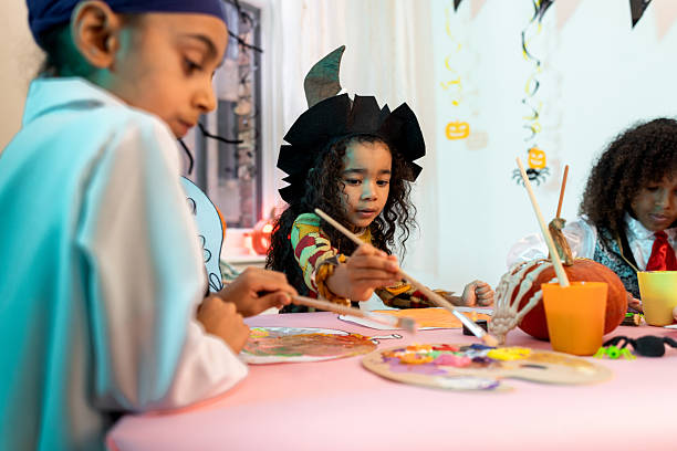 istock Little Kids Creating Halloween Artwork Together 2232484742