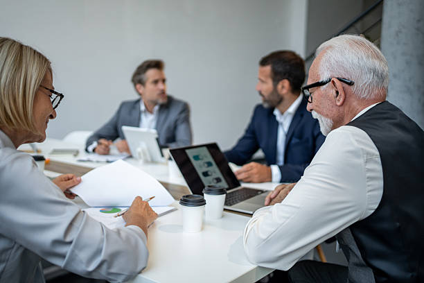 istock Business people working together during corporate meeting 2232485634