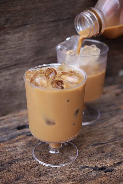 istock Pouring coffee with ice on glass 2232486581