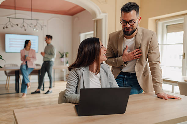 istock Managers expressing gratitude to employee for achieving goals 2232487828