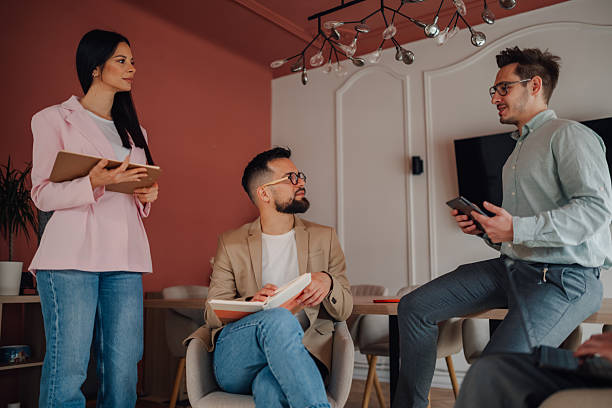 istock Business team collaborating on project in modern office 2232487888