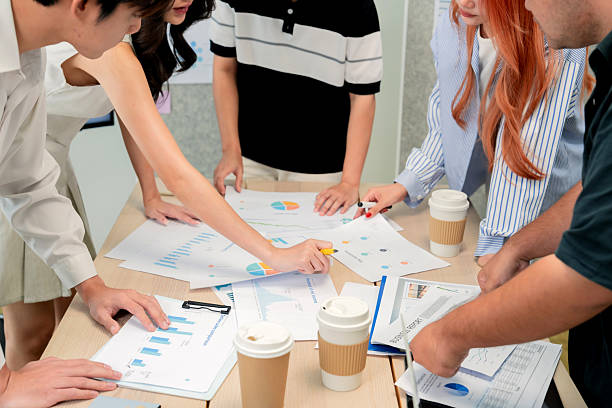 istock During an agile hackathon, a closeup of hands shows a team using data analytics for strategic insights. This collaboration drives innovation and digital transformation 2232488153