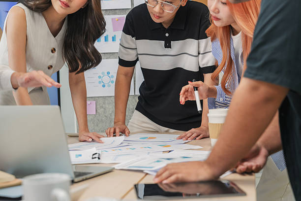 istock During an agile hackathon, a closeup of hands shows a team using data analytics for strategic insights. This collaboration drives innovation and digital transformation 2232488197