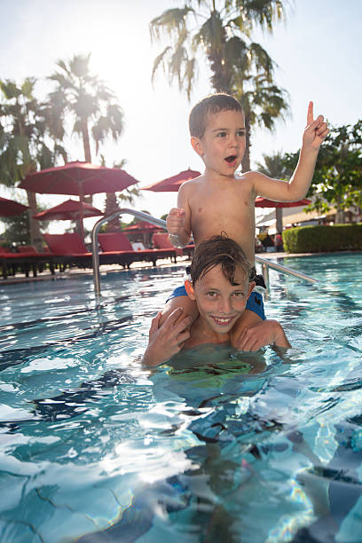 istock Little dictator even when he is in the water. 2232493117