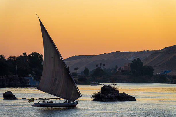 istock Felucca (traditinal egyptian sailing boat) on the Nile river at sunset  in Aswan, Egypt 2232494166