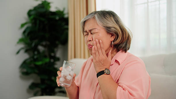 istock Teeth sensitivity from drinking cold water in a senior woman 2232495460