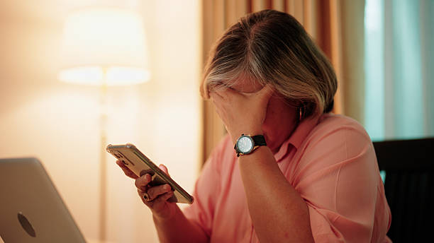 istock Asian older woman experiencing digital fatigue after extended smartphone use 2232495679