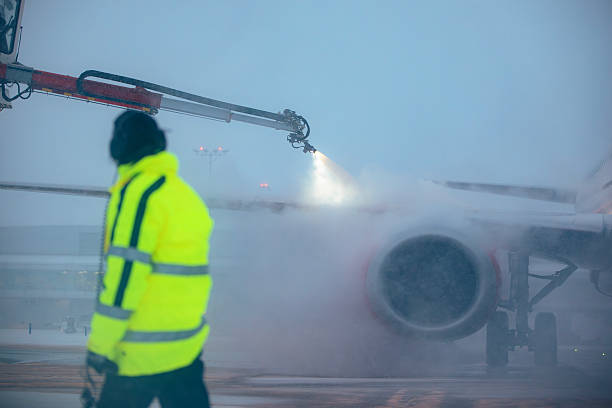 istock Deicing of airplane before flight at airport 2232497230