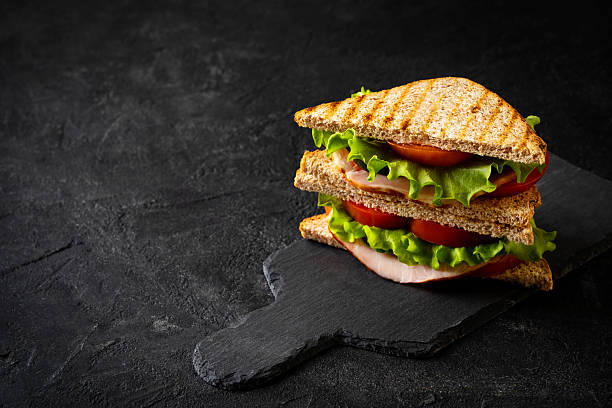 istock Sandwich toast with fresh salad, tomato, bacon 2232507160