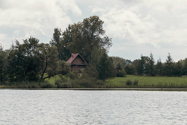 istock Wooden House by the Water 2232508729