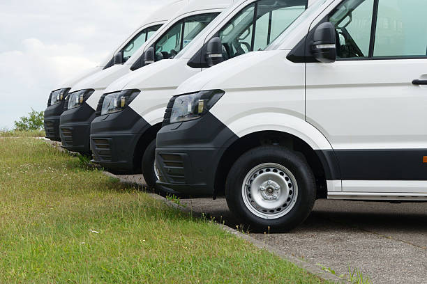 istock Commercial delivery vans in a row 2232511847