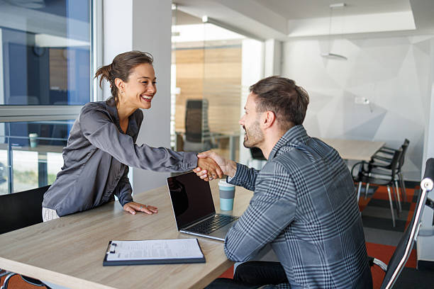 istock Business people shaking hands after successful job interview 2232515982