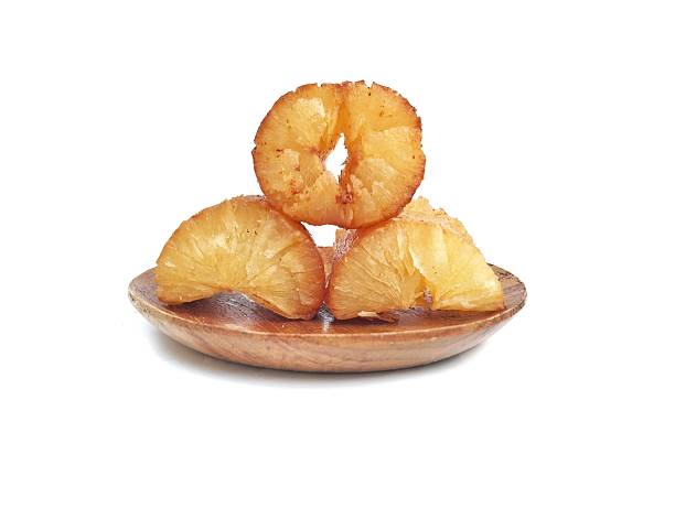 istock Fried cassava on wooden plate isolated on white background 2232517872