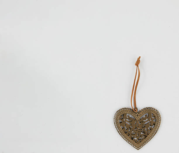 istock Christmas ornaments with hanging ropes isolated nature background with clipping path 2232518770