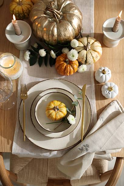 istock Stylish table setting with beautiful dishware and autumn decor in dining room, top view 2232521138