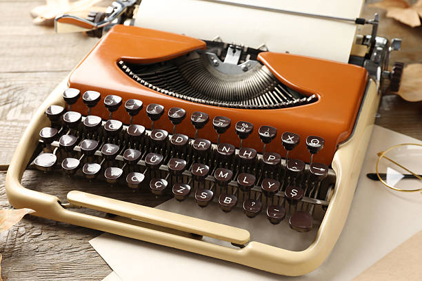 istock Vintage typewriter and paper sheets on table, closeup 2232522855