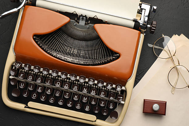 istock Flat lay composition with vintage typewriter on black background 2232522891