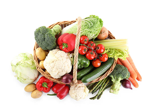 istock Different ripe vegetables in basket isolated on white, top view 2232523566