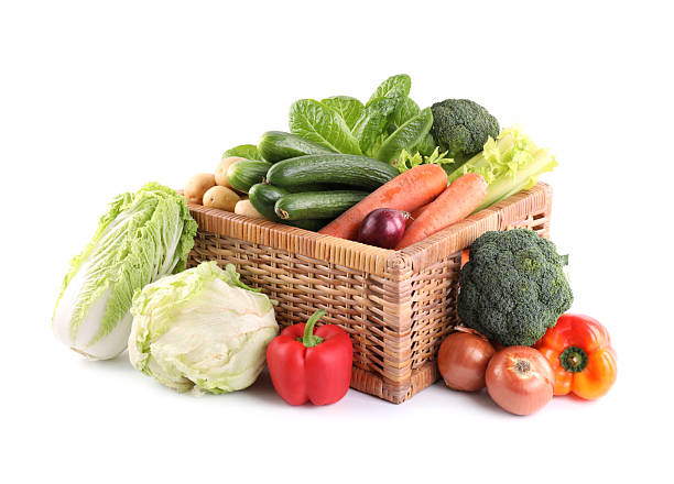 istock Different ripe vegetables in wicker box isolated on white 2232523712