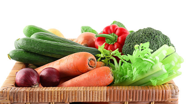 istock Different ripe vegetables in wicker box isolated on white 2232523717