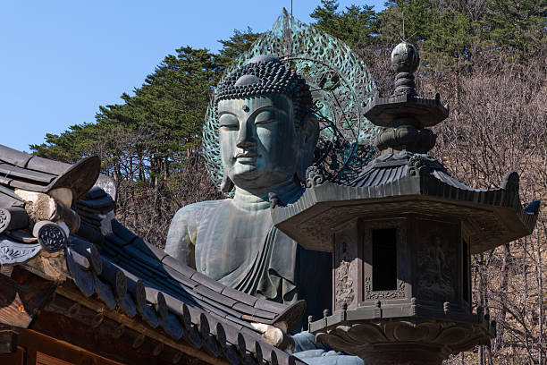 The Great Buddha (Daibutsu) buddha at the Wat Doi Phra Chan Buddhist temple the city of Mae Tha in Lampang,Thailand.