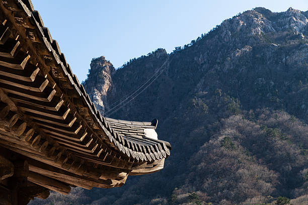 istock traditional Korean eaves against the cable car and mountain 2232527467