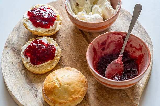 istock Traditional british scones with clotted cream and jam 2232527793