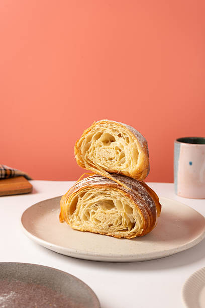 istock Sliced croissants on a pink background 2232529182