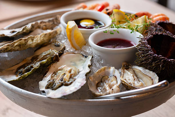istock fresh shucked oysters on the half shell close-up 2232529196