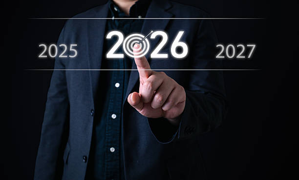 istock Goal setting concept with businessman pointing at 2026 on virtual screen with target icon, symbolizing strategic planning, business vision, future goals, and long-term success objectives. 2232530437