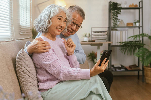 istock Happy couple spending time on home sofa 2232531067