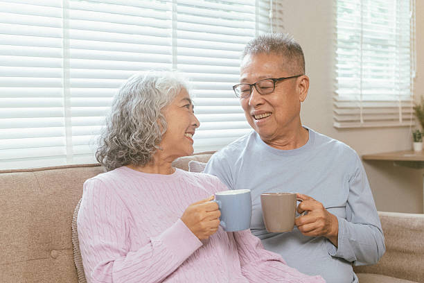 istock Happy couple spending time on home sofa 2232531069