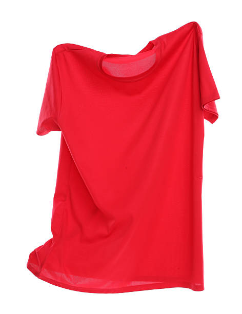 istock One red t-shirt in air isolated on white 2232532565