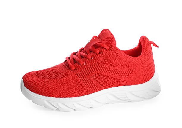Sport shoes with red sole above top view isolated