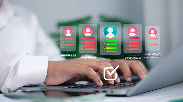 istock Human resources manager using laptop with digital candidate profile icons, online recruitment and HR technology concept for hiring and talent management 2232539457