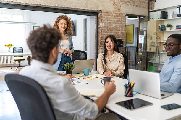 istock Young professionals collaborating on a project in a modern office 2232539588