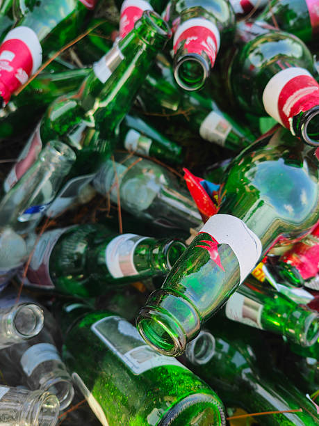 istock Pile of Empty Beer Bottles 2232539919