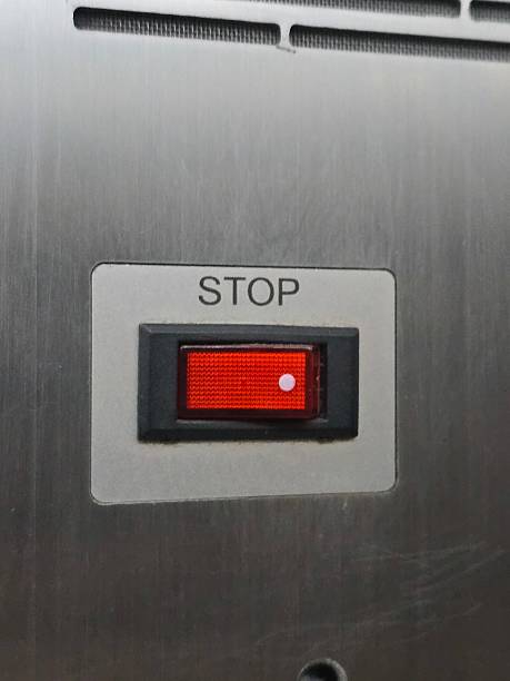 istock Red Stop Button Switch on Metal Panel for Industrial Applications 2232556926