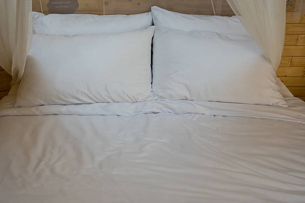 istock Comfortable hotel room with perfectly bed and decorative pillows 2232557778