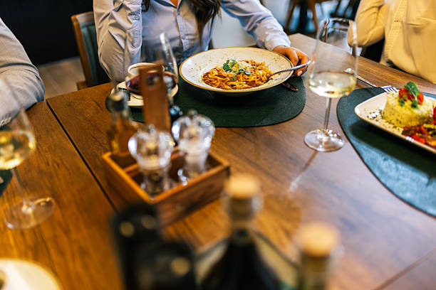 istock Hands About to Eat Tagliatelle Bolognese in Restaurant 2232557835