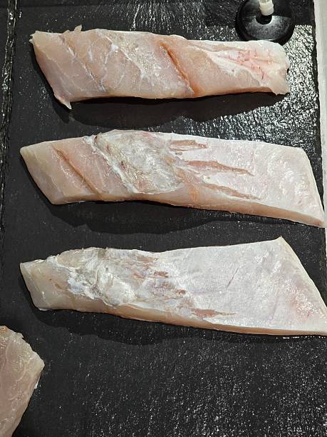 istock Fresh Fillets of White Fish Prepared for Culinary Presentation 2232559739
