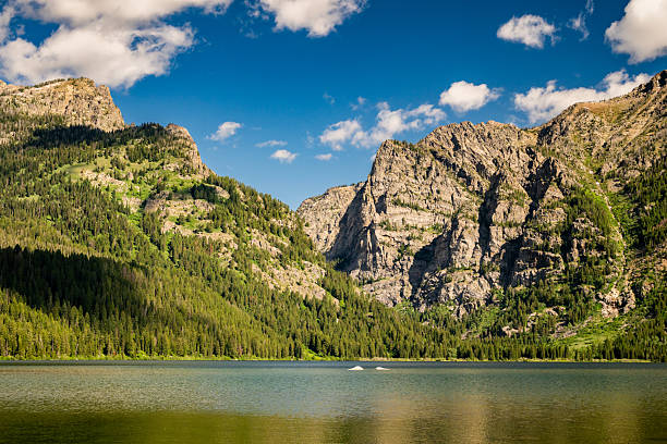 Puffy Clouds and Deep Blue Sky Over Death Canyon in Grand Teton National Park