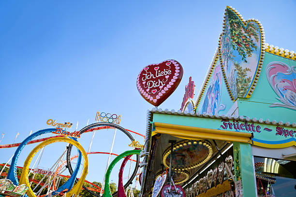 istock Festive Booth and Roller Coasters in Munich, Bavaria, Germany 2232564754