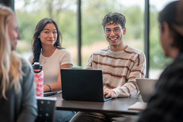 istock Diverse Group of Students Collaborating in a Study Session at a Modern Campus 2232566112