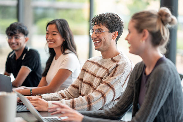 istock Diverse Group of Young Professionals Collaborating in a Modern Office Environment 2232566123