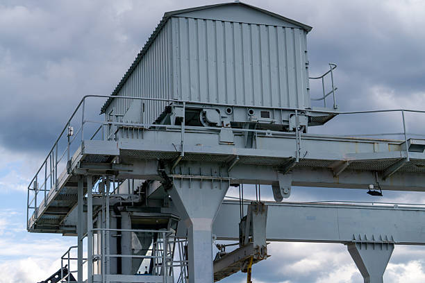istock Metal technical structure at Solina Dam, industrial steel elements with platform and stairs against cloudy sky background. 2232571244