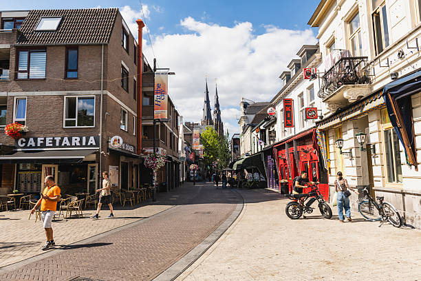 Eindhoven, Netherlands - August 24, 2025: A view of Stratumseind, a street with bars, cafes, and clubs, in Eindoven's city center.