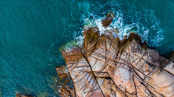 istock Drone views of a tropical stone coastline 2232573276