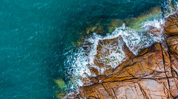 istock Drone views of a tropical stone coastline 2232573309