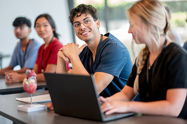 istock Medical Students Learning Together in a Classroom Environment 2232575519